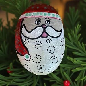 Hand crafted painted Santa Claus rock red green white hat beard round stone dots